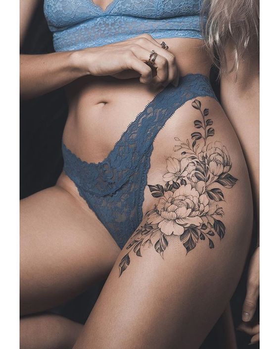 stunning thigh tattoo women