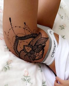stunning thigh tattoo for women 