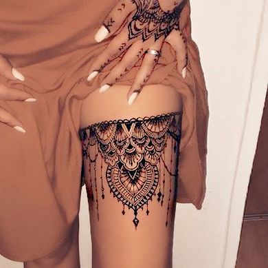thigh tattoo for women 