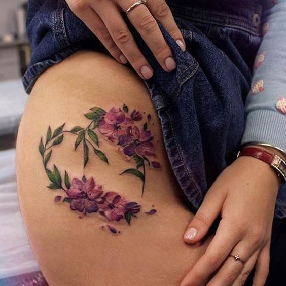 thigh tattoo for women 
