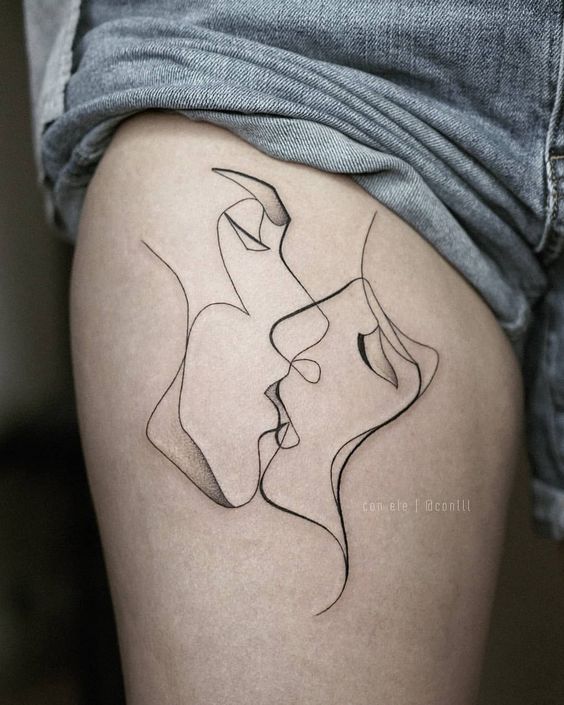 thigh tattoo women - kissing