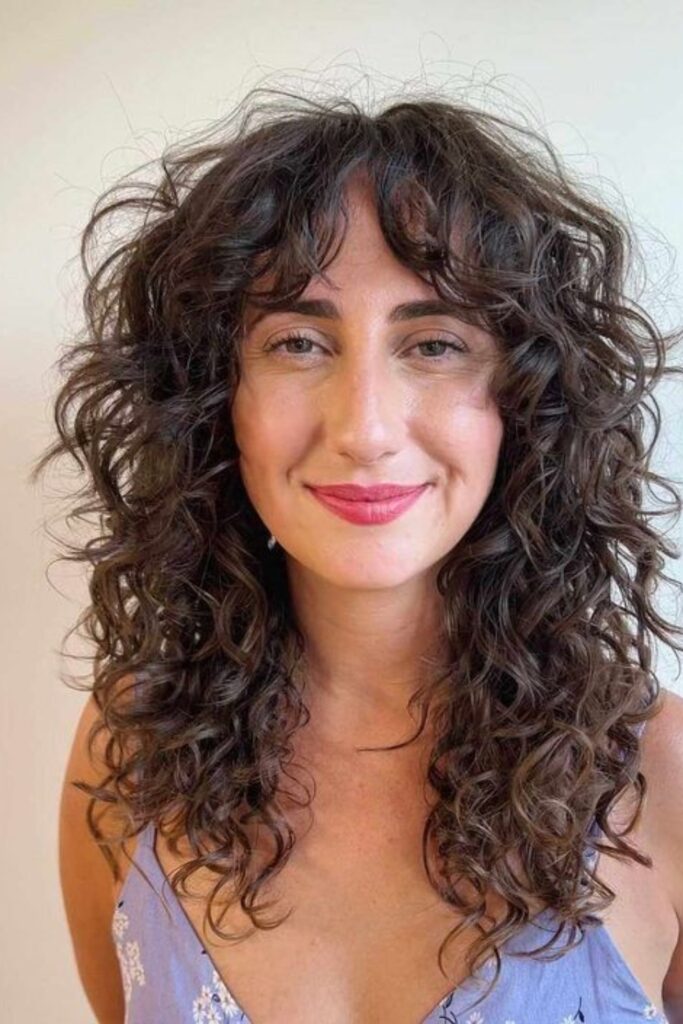 Guide to Curtain Bangs for Women with Curly Hair - Wittyduck